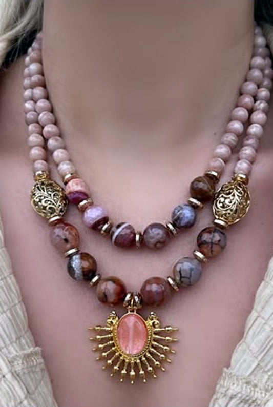 Two-strand sunstone and banded agate necklace set with a gold sunburst pendant